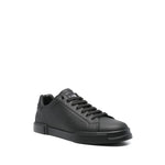 Dolce & Gabbana Sneakers Black with lace-up fastening, round toe, flat rubber sole made from Portofino leather.