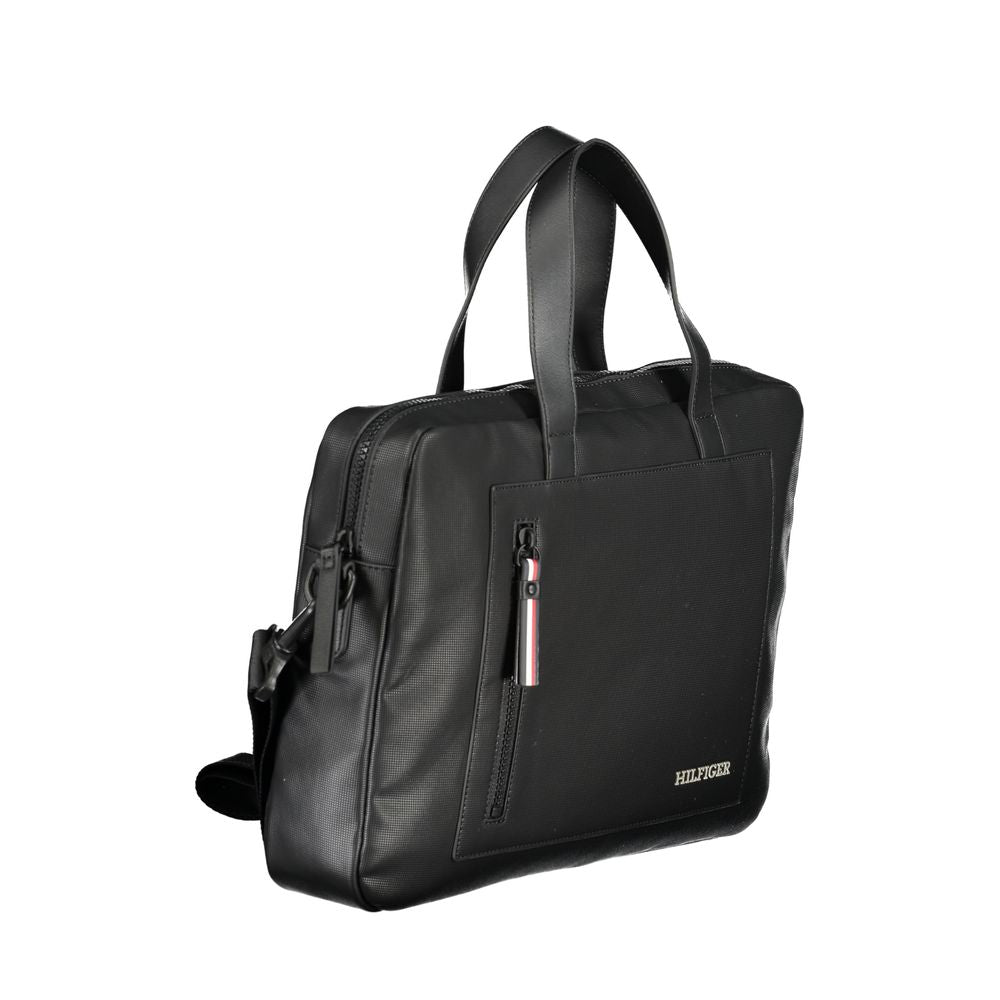 Tommy Hilfiger Black Polyester Accessory briefcase with handles and shoulder strap, featuring external pocket and laptop compartment.