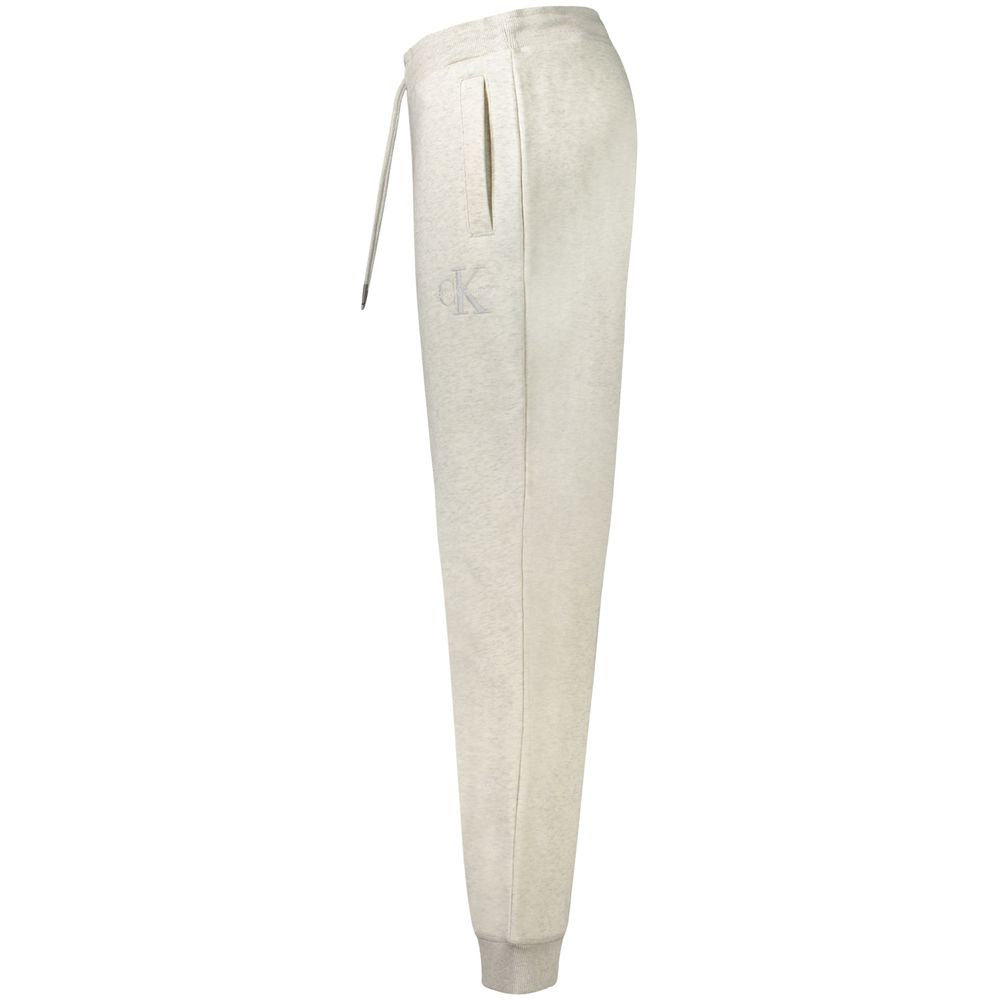 Calvin Klein Gray Cotton Pant with fleece, elastic waist, lace ties, and cuffs; features embroidery and logo, made with 20% recycled cotton.
