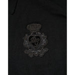 Close-up of the logo patch on the Dolce & Gabbana Black Logo Patch Collared Pullover Sweater.