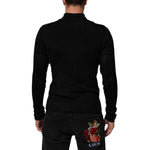 Dolce & Gabbana Black Viscose Turtle Neck Pullover Sweater, rear view on a model showcasing the sleek fit and design.