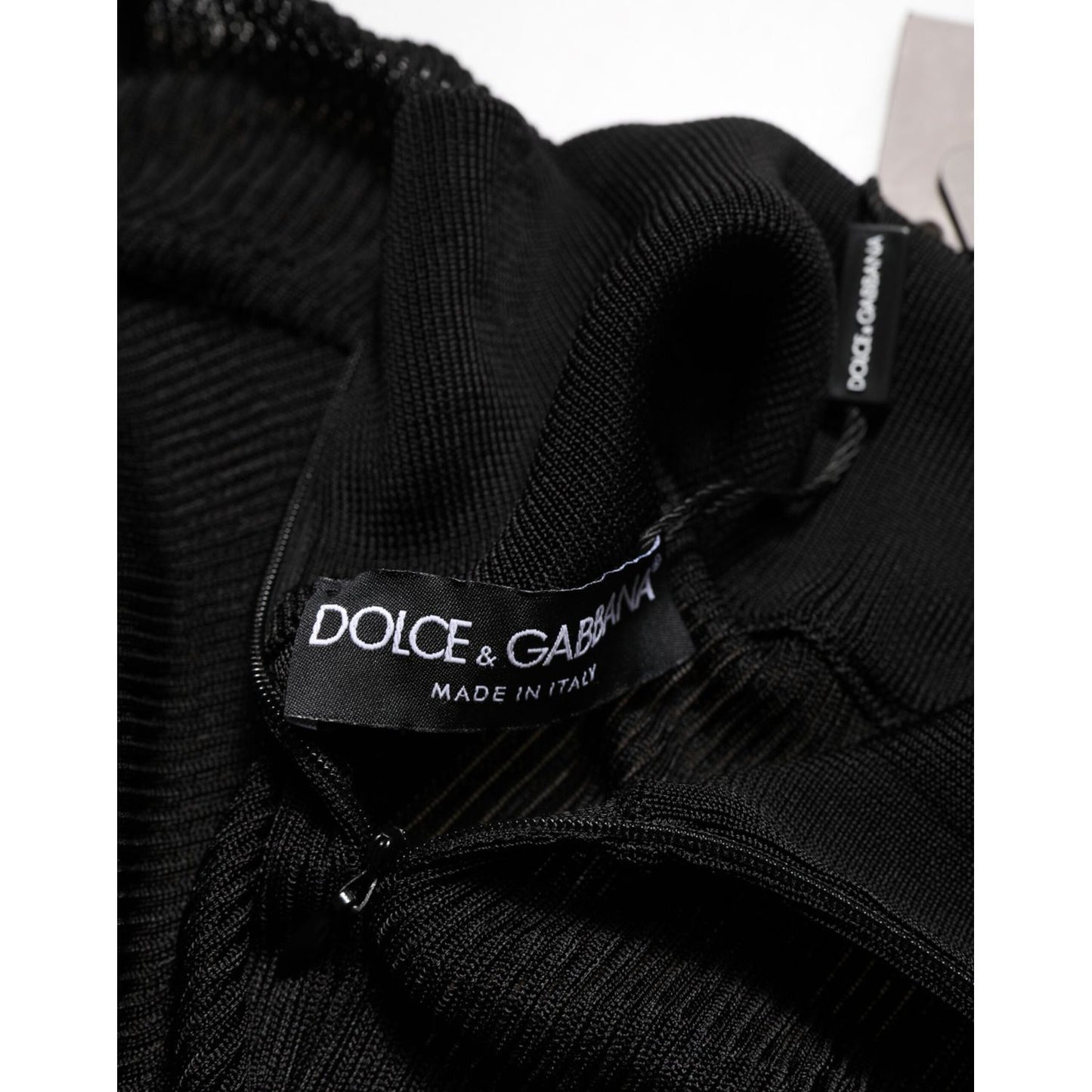 Dolce & Gabbana Black Viscose Turtle Neck Pullover Sweater close-up label showing Made in Italy craftsmanship.