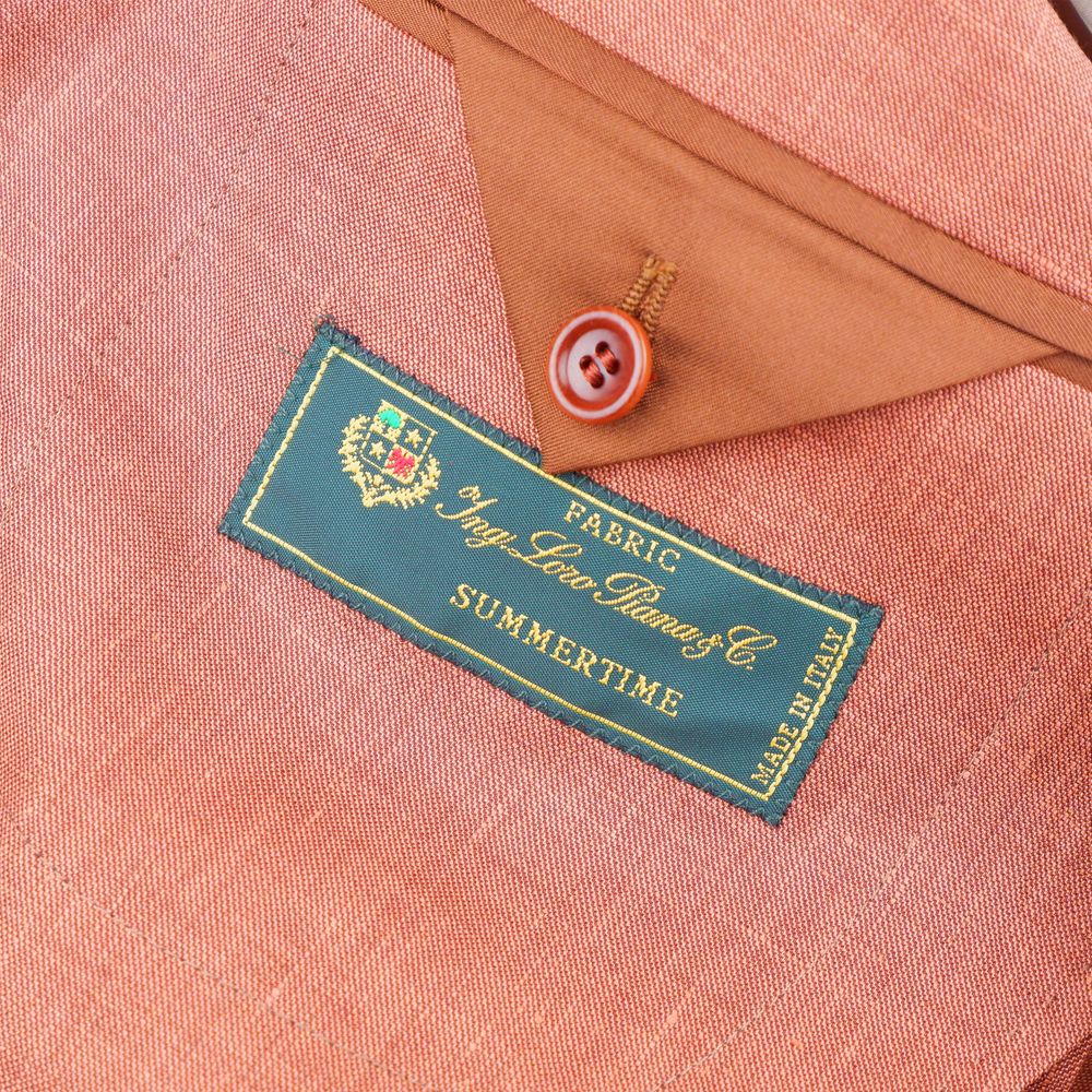 Alt Tag: Label of Made in Italy Brown Linen Blazer with Loro Piana Summertime fabric tag in rust color