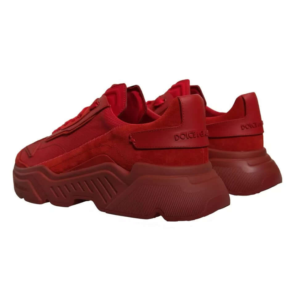 Dolce & Gabbana red leather Daymaster low top sneakers with unique chunky soles, showcasing high craftsmanship and exclusive design.