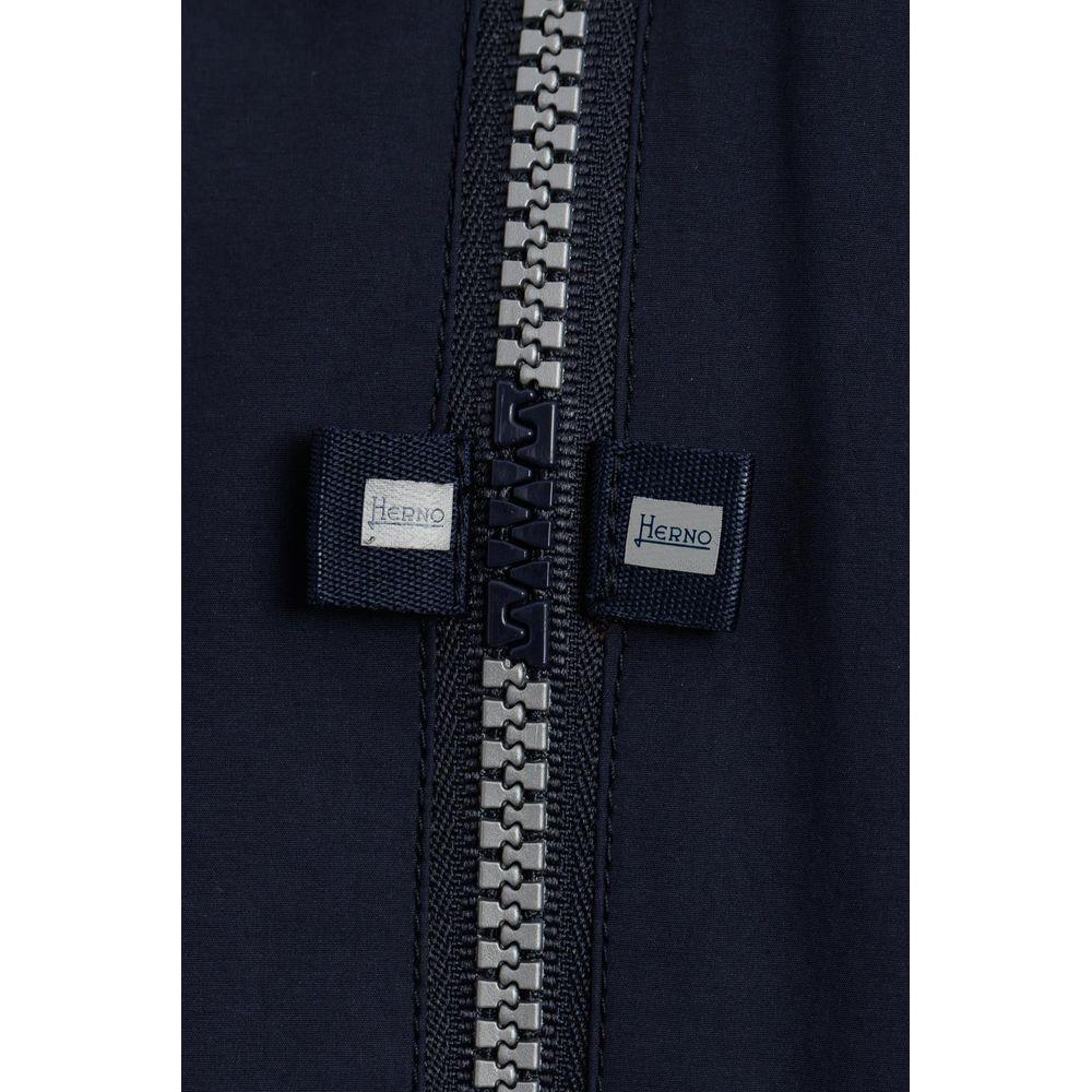 Close-up of Herno blue nylon jacket zipper detail.