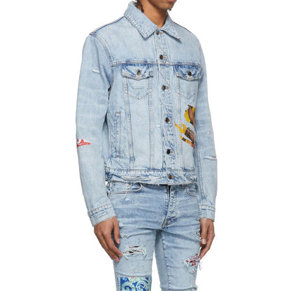 Amiri Blue Cotton Denim Jacket with multicolor prints, featuring long sleeves, button closure, and side pockets for men.