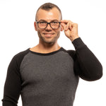 Man wearing Lozza Black Men Glasses Frame, rectangle full-rim plastic eyeglasses with demo lenses, black color, 54-17-140 size, stylish look.