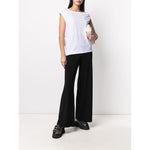 Norma Kamali Trousers Black, mid-rise wide leg Jersey trousers in a black stretch design, ankle-length style.