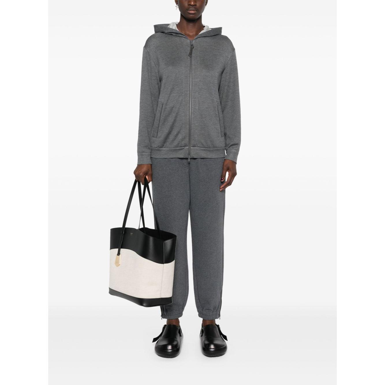 Front view with bag zipped and handles upright.
