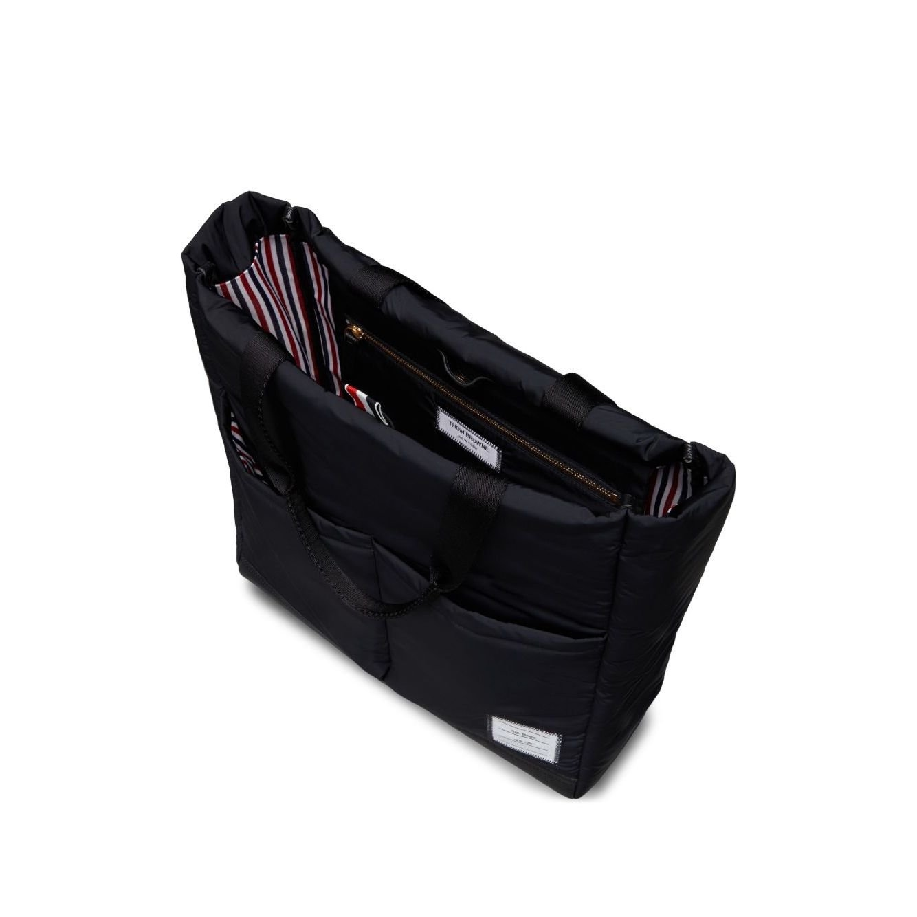 Front view with bag zipped and handles upright.
