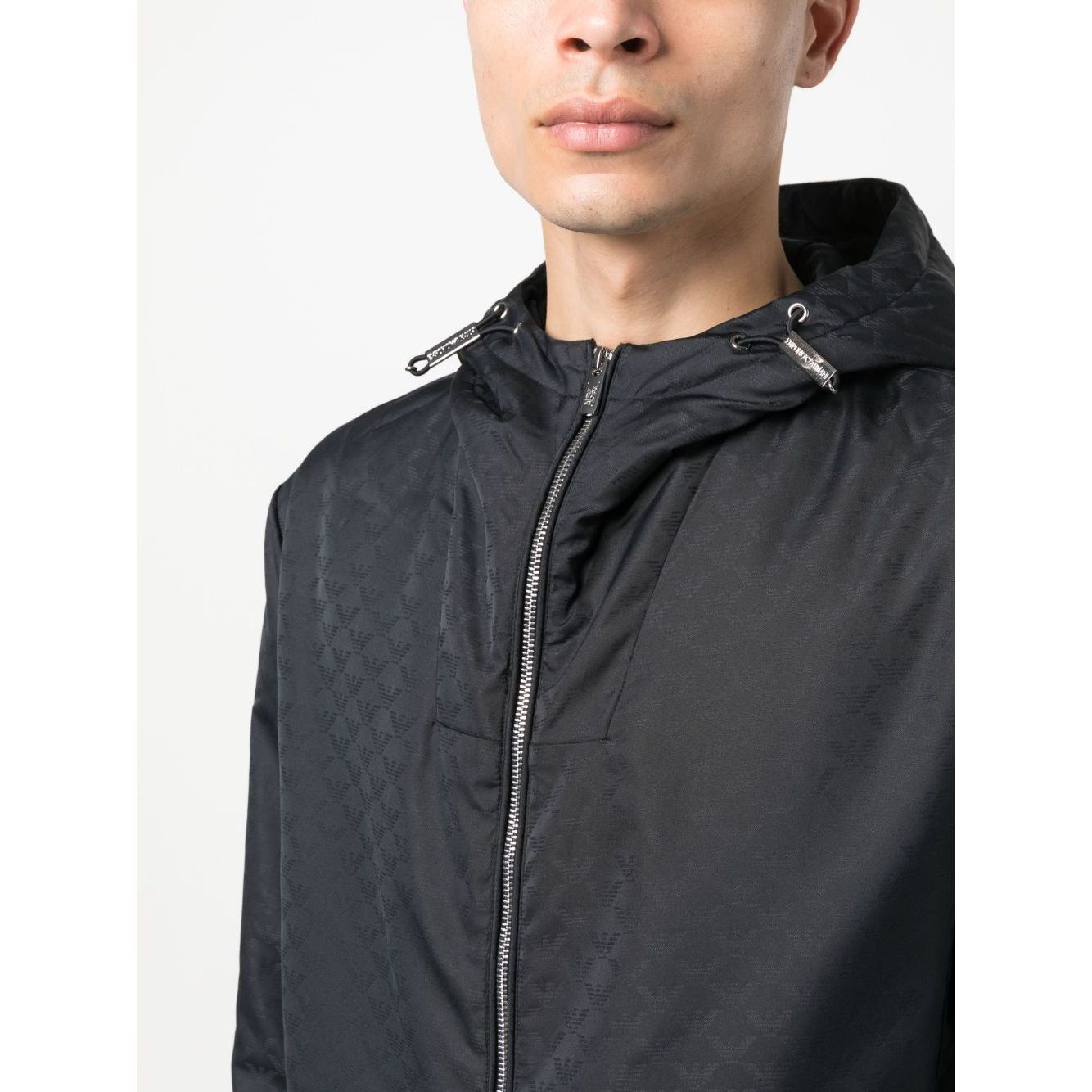 Emporio Armani Coats Blue monogram jacquard nylon blouson jacket with drawstring hood and two-way zip fastening.