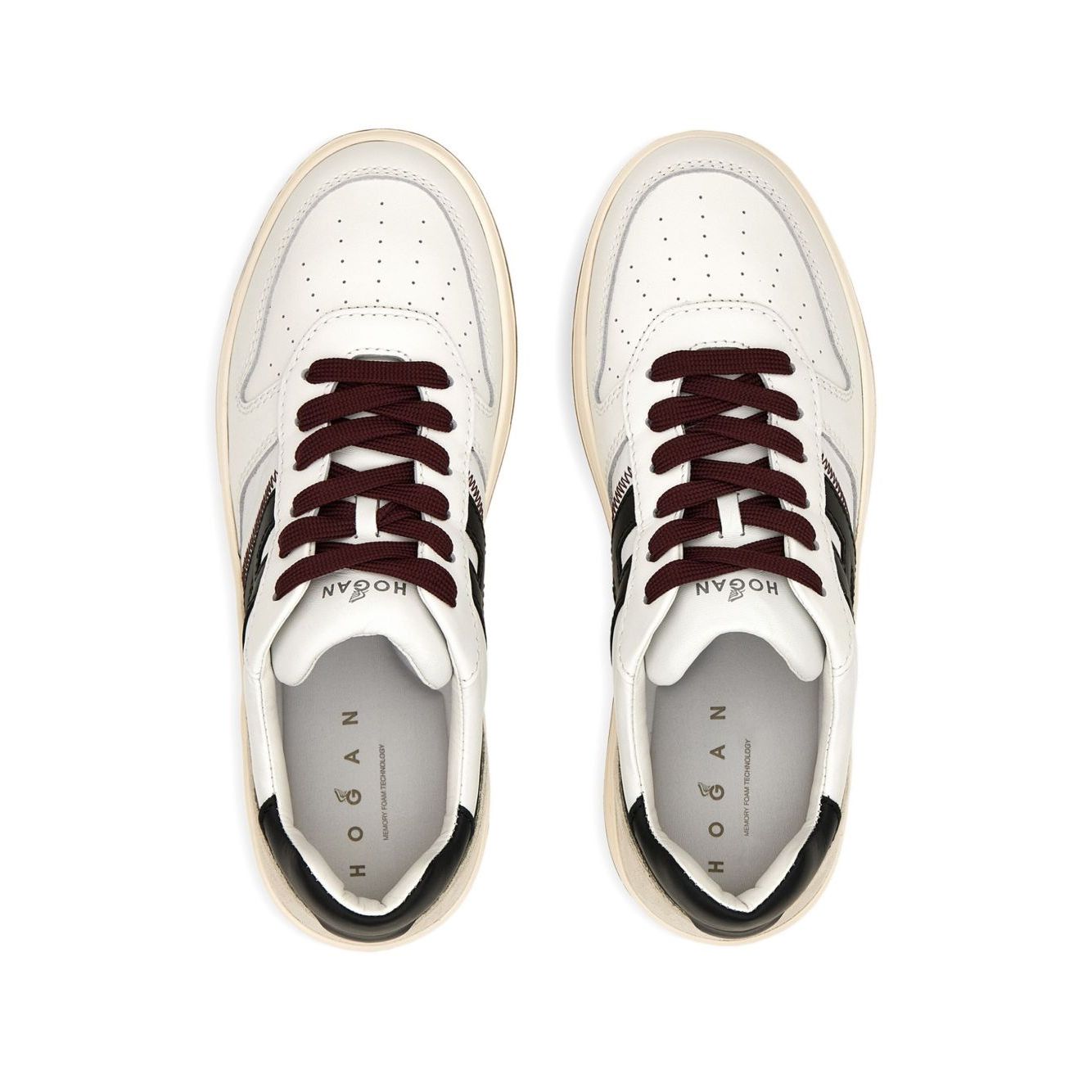 Hogan Pre Sneakers Hogan H630 featuring white leather, contrasting panels, suede detail, rubber sole, and perforated toe box.