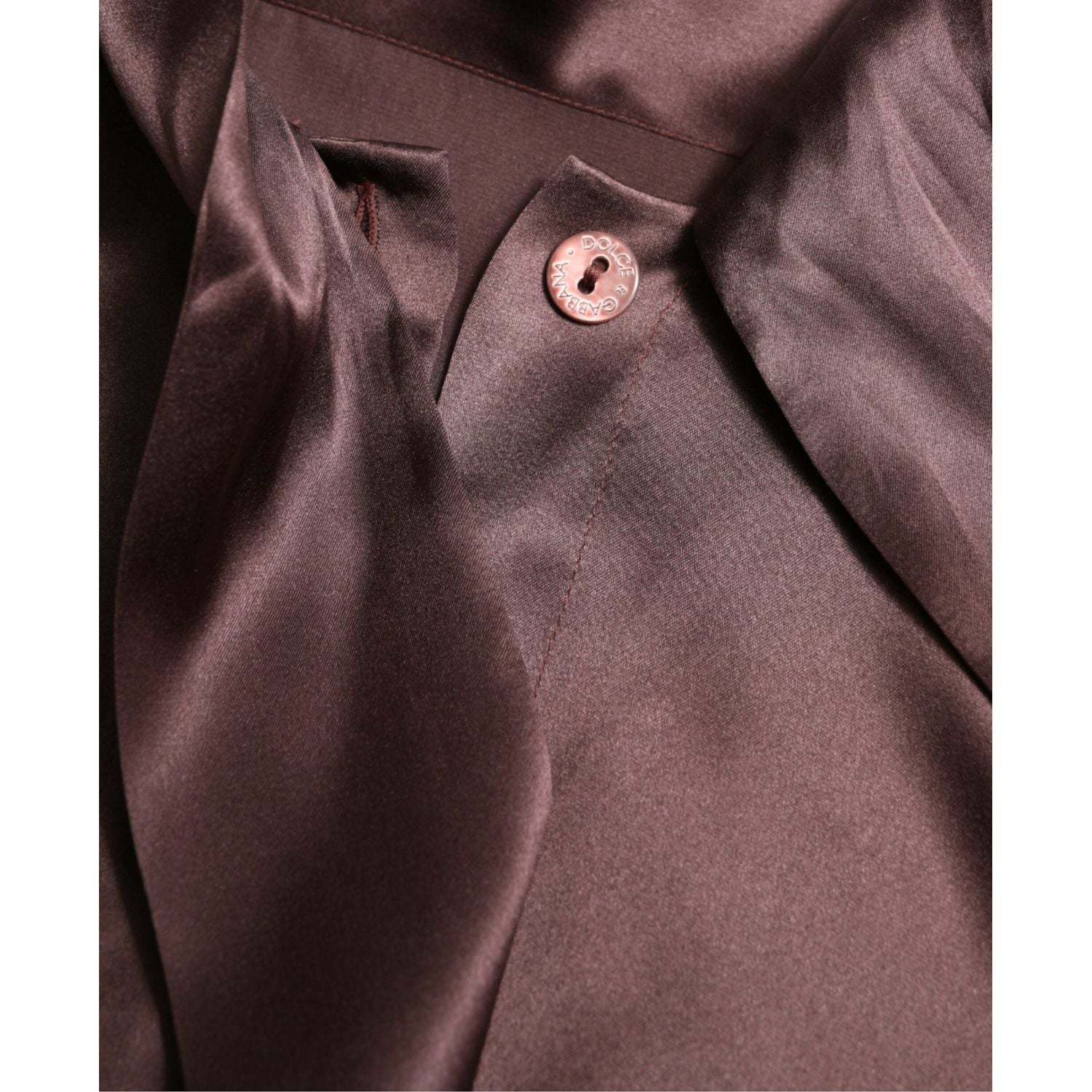 بلوزة دولتشي آند غابانا الحريرية الأنيقة بياقة أسكوت