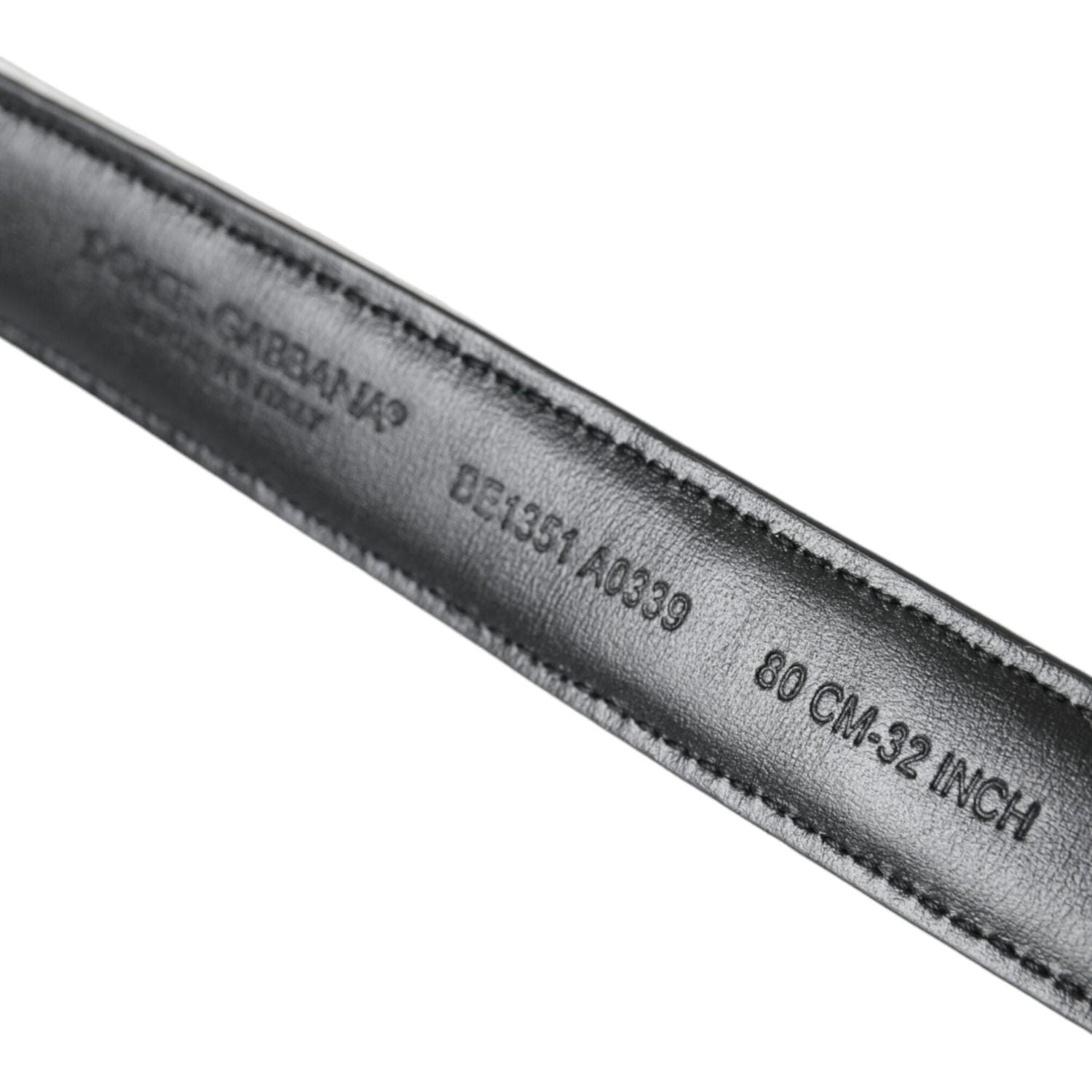 حزام دولتشي آند غابانا باللونين الأسود والأبيض مع مشبك معدني ذهبي