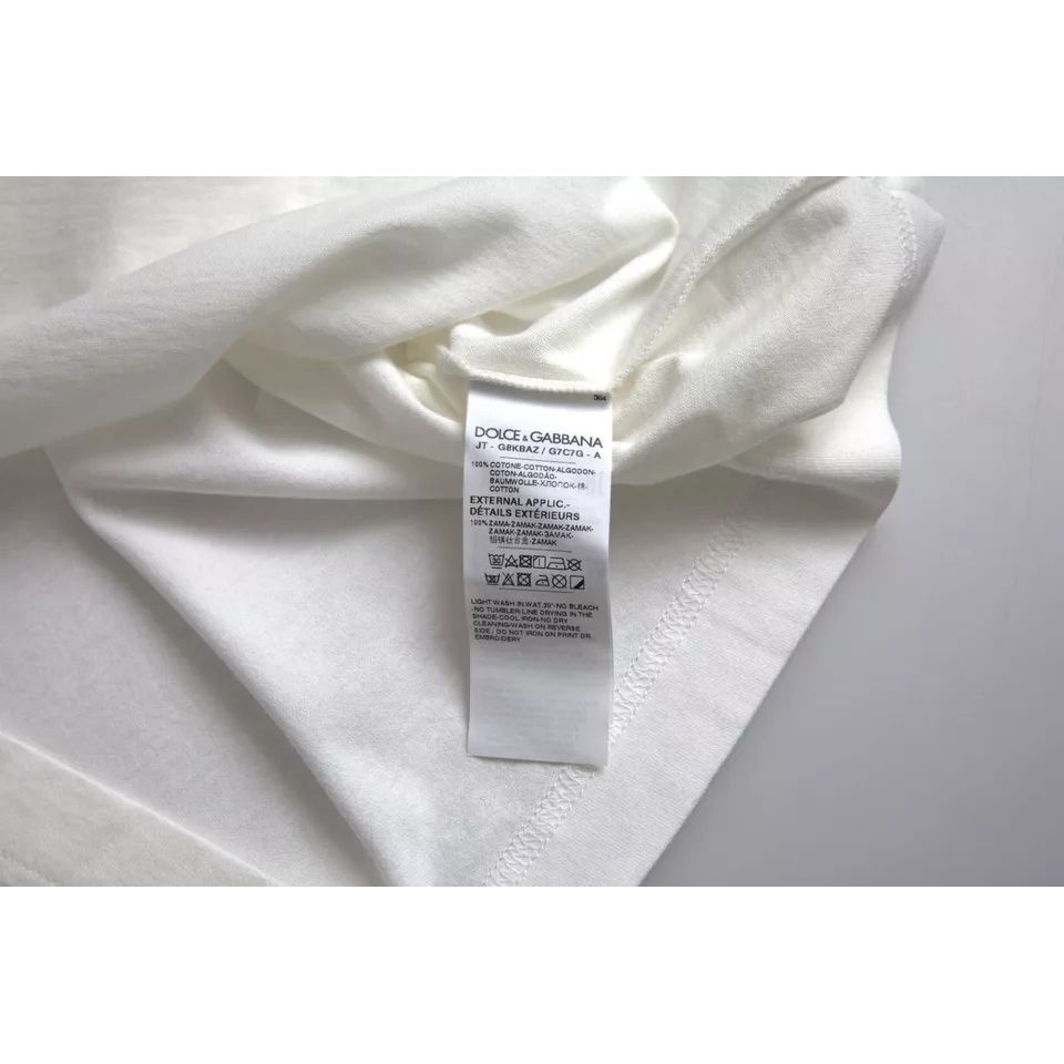 تي شيرت Dolce &amp; Gabbana أبيض من القطن بطبعة شعار الأزهار ورقبة دائرية