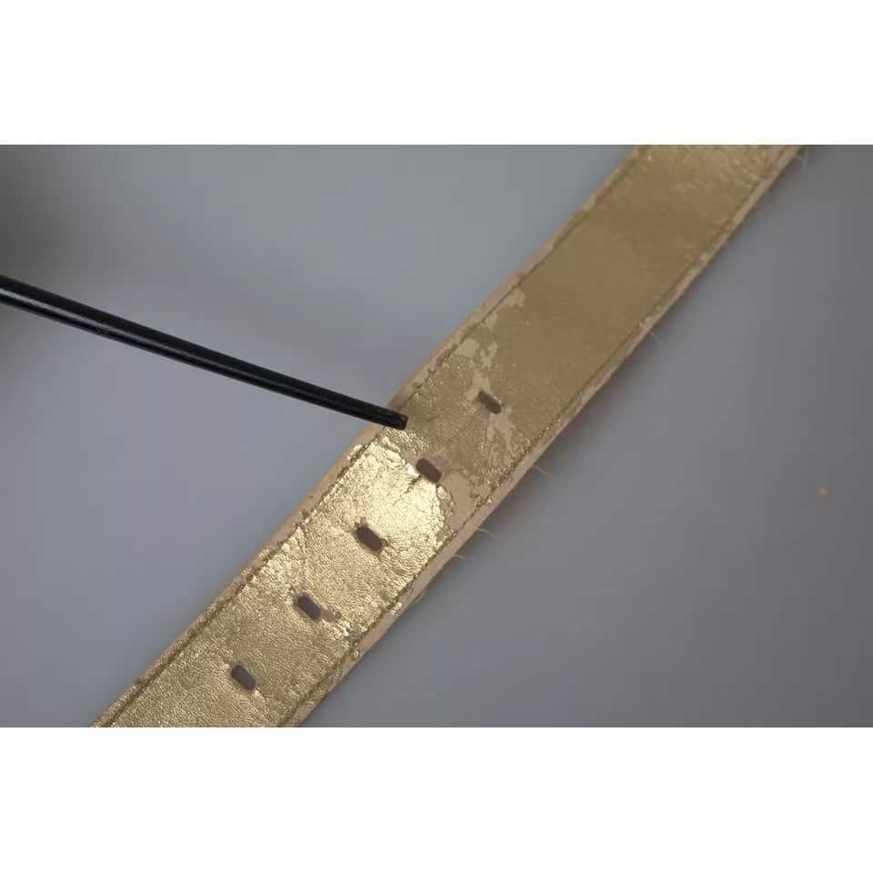 حزام دولتشي آند غابانا الذهبي المصنوع من الجلد الساتان بمشبك معدني بيضاوي