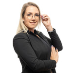 Woman wearing Sandro Black Women Glasses Frame, aviator style, metal full-rim with demo lenses, in professional attire on a white background.