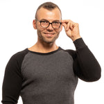 Man wearing Lozza Black Men Glasses Frame, showcasing full-rim, rectangle style with plastic lenses.