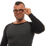 Man smiling wearing Ermenegildo Zegna Black Men Glasses Frame, black full-rim, square style, with a branded case included.