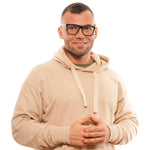 Man wearing Sandro Black Men Glasses Frame with acetate full-rim design, perfect for a modern look and comfortable fit.