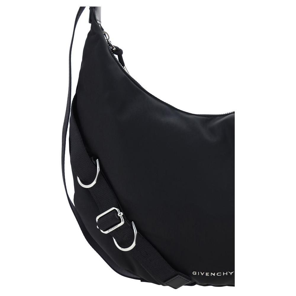 Front view with bag zipped and handles upright.