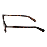 Side view of Guess Brown Women Glasses Frame, full-rim round style with plastic material, showcasing brown color and tortoise pattern.