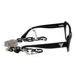 Guess Black Women Glasses Frame in full-rim cat eye style with black plastic frame, demo lenses, and attached eyewear chain.