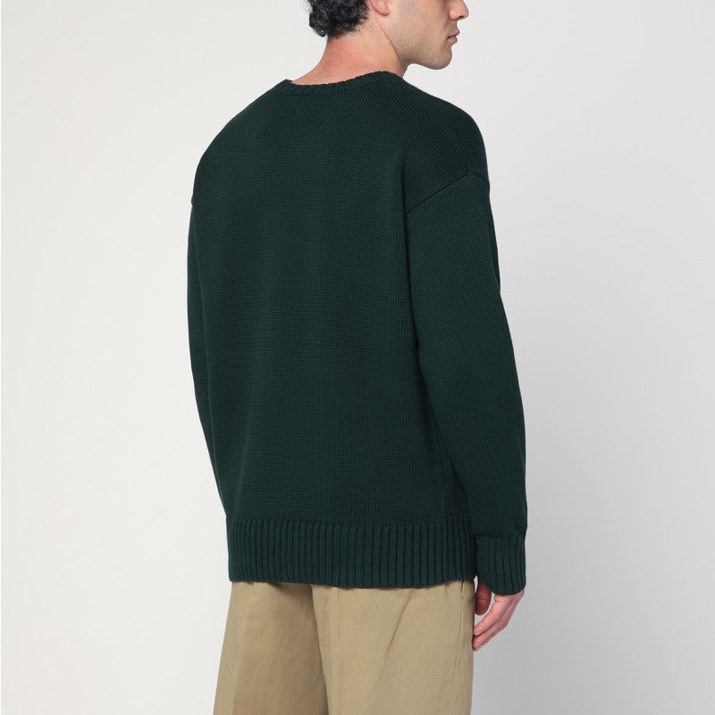 Front view with bag zipped and handles upright.