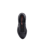 Top view of Prada America's Sneakers in black, featuring lace-up closure and leather-textile design.