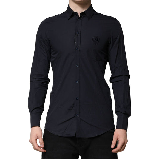 Man wearing Dolce & Gabbana Dark Blue MARTINI Cotton Dress Formal Shirt with classic neck and button closure. Made in Italy.