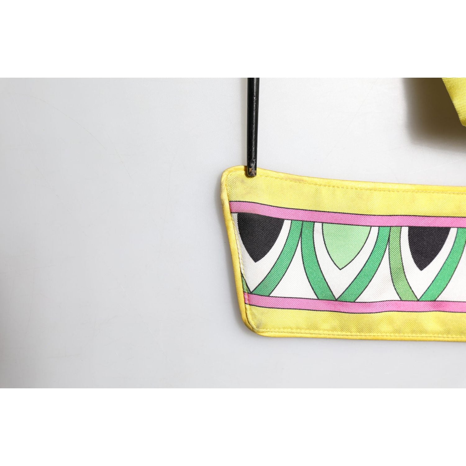 Front view with bag zipped and handles upright.