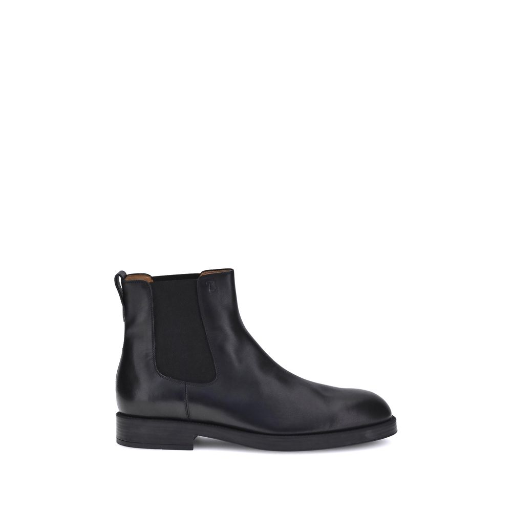 Tod's Black Calf Leather Bos Taurus Chelsea Boots with elastic side inserts and back tab for comfort.