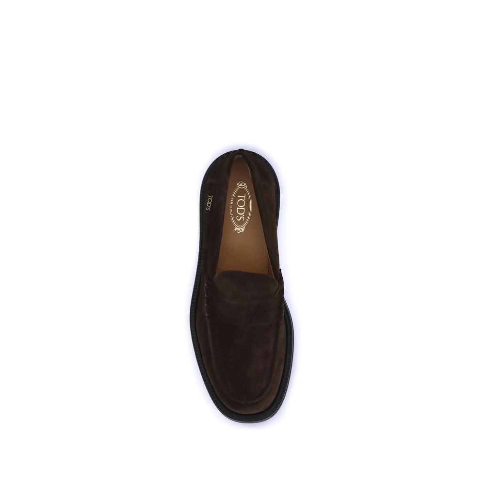 Top view of Tod's Brown Rubber Slip-On Loafers showcasing craftsmanship and elegance.