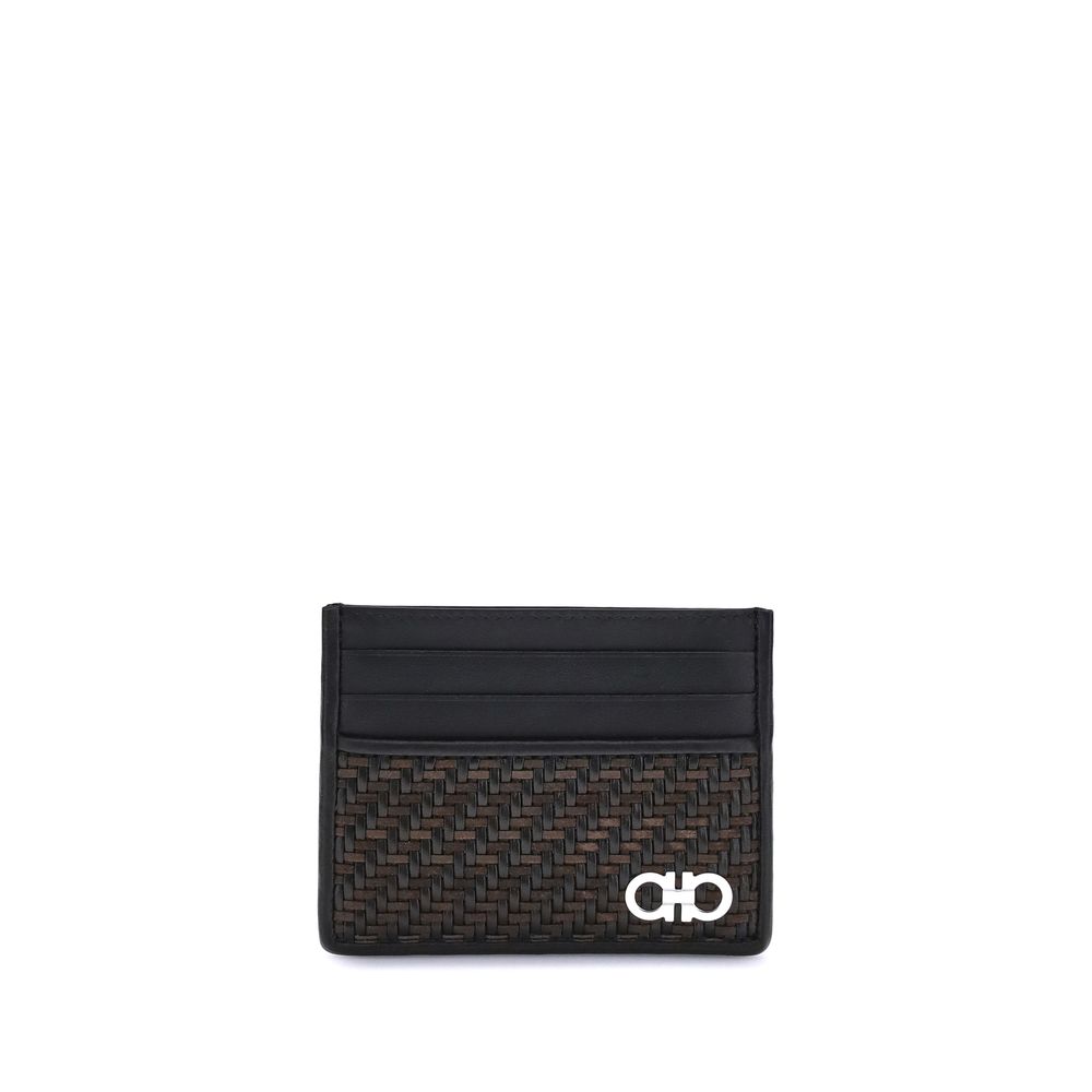 Ferragamo Black Calf Leather Bos Taurus Wallet with Gancini ornament and woven design.