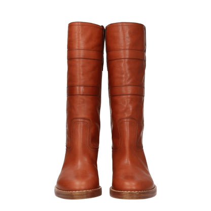 Celine Brown Leather Boots with vintage effect and side logo, featuring mid heels and round toe.