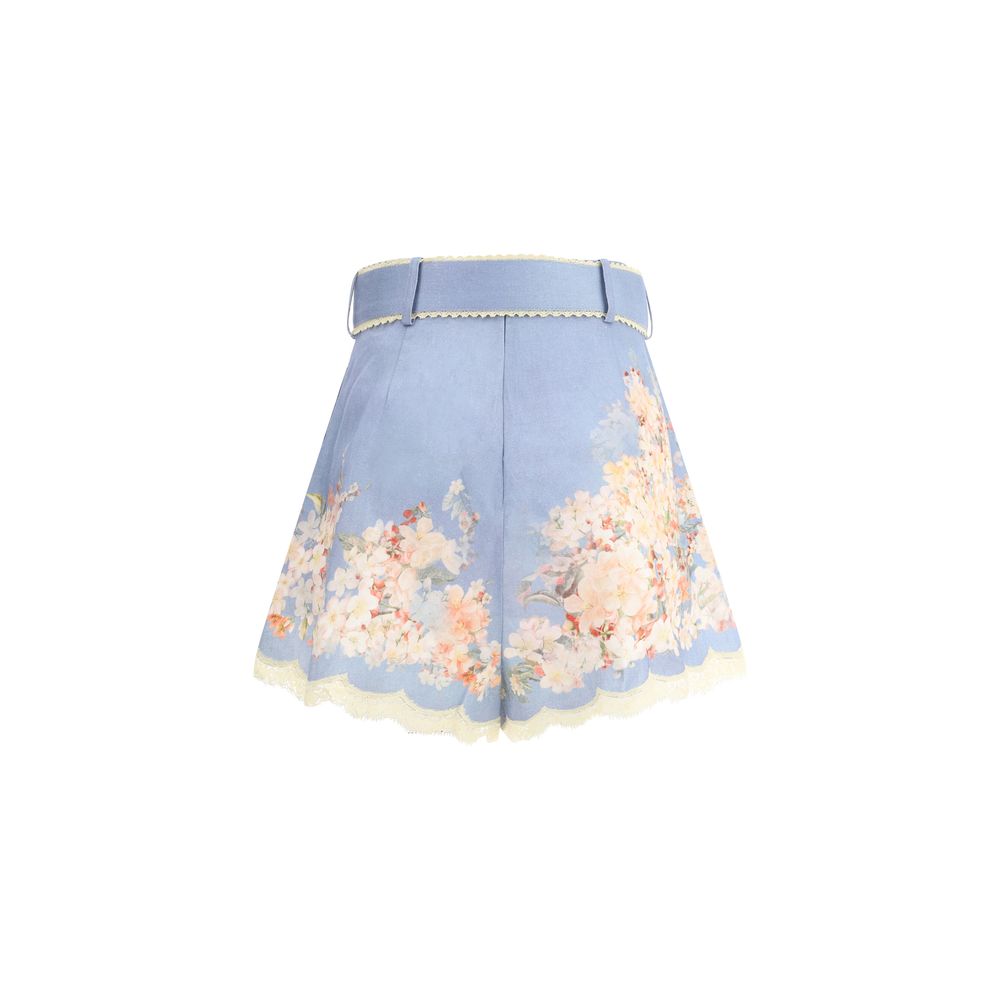 Zimmermann Light Blue Linen Bermuda Shorts with botanical print and belted waist for a chic summer look.