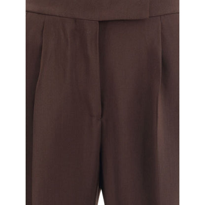 Close-up of Tom Ford Brown Viscose Casual Pants showcasing elegant wide leg design and detailed side buckles, made in Italy.
