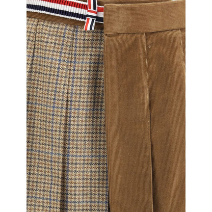 Thom Browne Brown Wool Mini Skirt with houndstooth and velvet layers, striped side band, pleats, and button closure details.