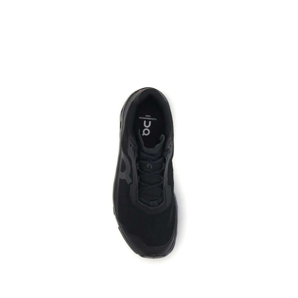 Top view of ON Black Recycled Polyester Athletic Sneakers with breathable mesh and Speedboard® plate.