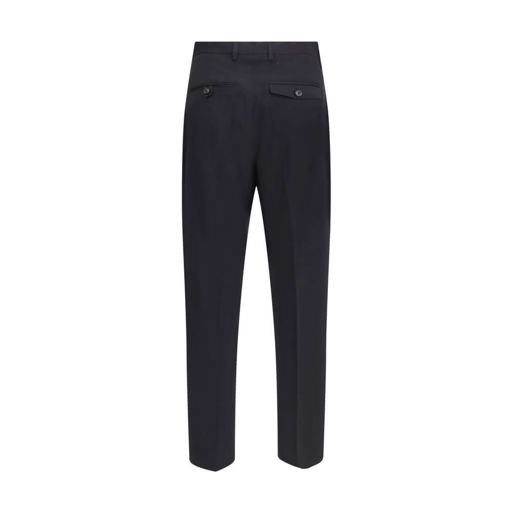 Back view of Our Legacy Black Fleece Wool Chino Pants, showcasing minimalist design and straight leg fit.