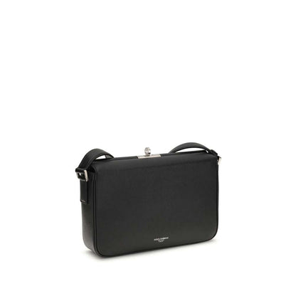 Dolce & Gabbana Black Calf Leather Bos Taurus Shoulder Bag with antique palladium-plated zipper closure.