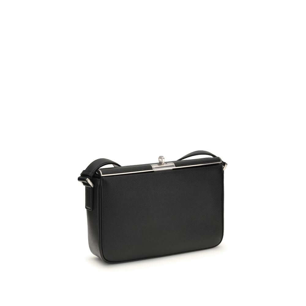 Dolce & Gabbana Black Calf Leather Bos Taurus Shoulder Bag with adjustable strap and antique palladium details.
