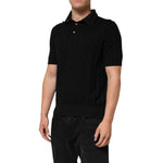 Dolce & Gabbana Black Silk Jacquard DG Polo Shirt T-shirt with monogram pattern and polo collar, worn by model.