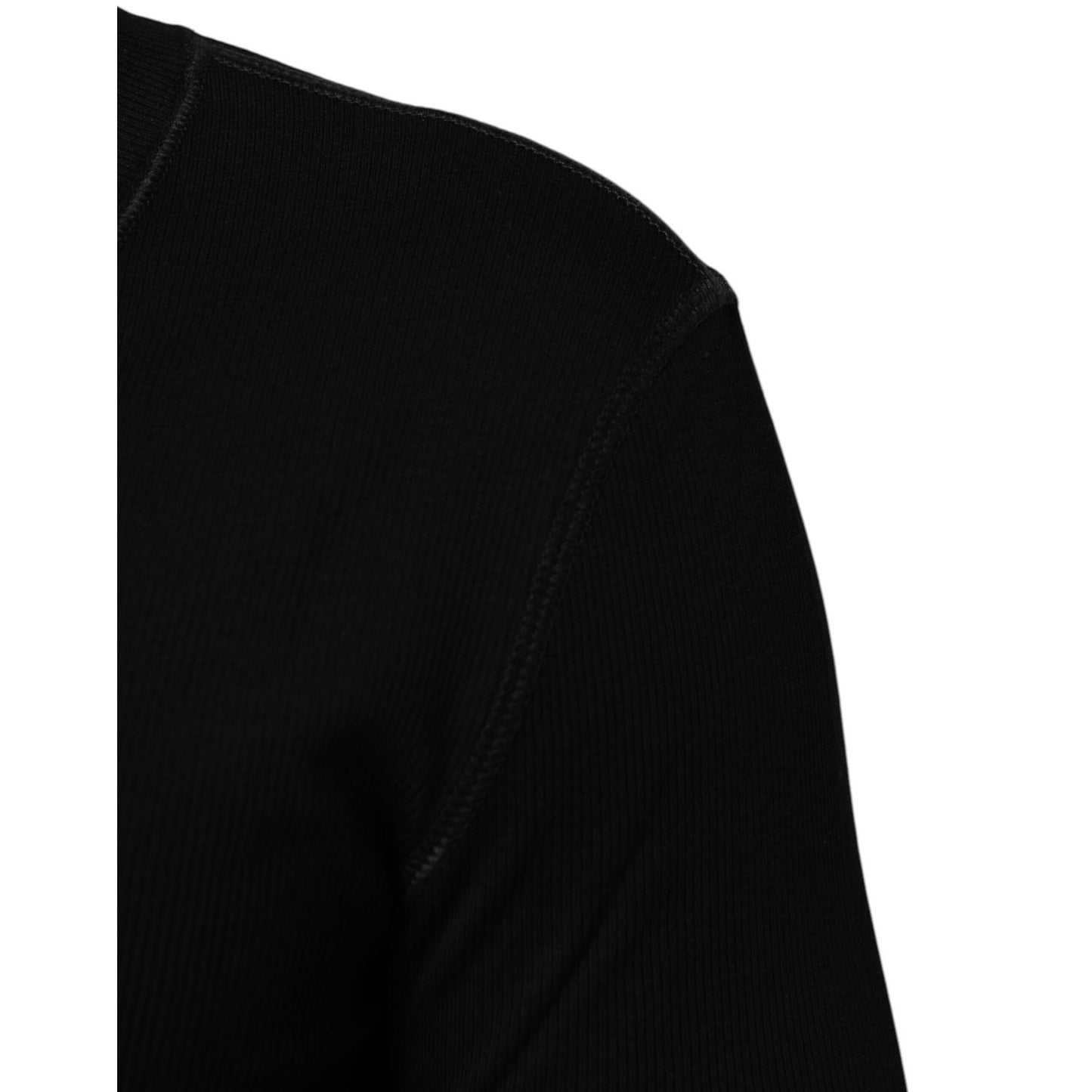 Close-up of Dolce & Gabbana Black Cotton Button Up Men Cardigan Sweater highlighting texture and stitching.