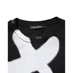 Dolce & Gabbana Black Cotton DG Logo Graffiti Short Sleeve T-shirt with white graffiti logo on black fabric, crewneck detail shown.