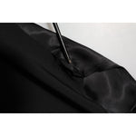 Close-up of Dolce & Gabbana Black Wool Dress Formal Men Waistcoat Vest fabric texture and details
