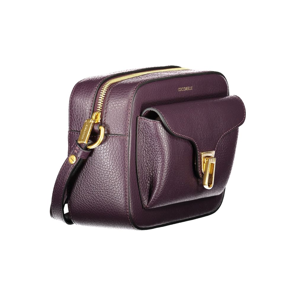 Coccinelle Purple Leather Women Handbag with adjustable strap, twist closure pocket, and zip closure, showcasing Italian craftsmanship.