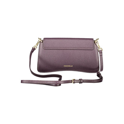 Coccinelle Purple Leather Women Handbag with adjustable shoulder strap and snap closure, showcasing Italian craftsmanship and style.
