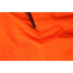 Close-up of Dolce & Gabbana Orange Polyester Beachwear Men Shorts Swimwear with zipper detail.