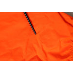 Close-up of Dolce & Gabbana Orange Polyester Beachwear Men Shorts Swimwear fabric.